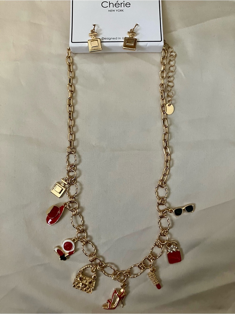 Gold-Tone Charm Necklace with Red Enamel Accents with Earrings